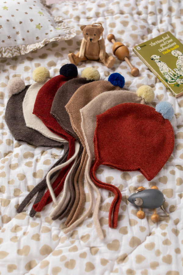 Cashmere Baby Bonnet, Rust with Spa Blue Pom